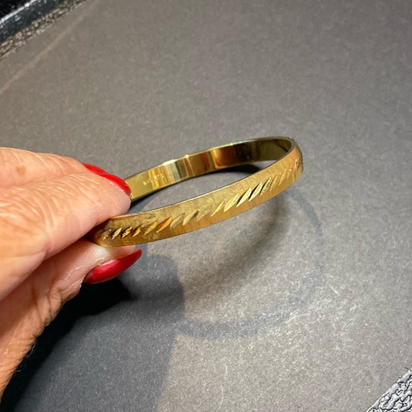 Monet bangle bracelet in gold tones with design